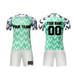Custom sublimation white-navy football jerseys – children’s kit with custom names, dye-sublimation technology